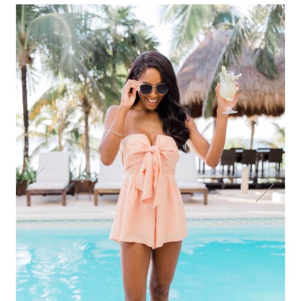 Never worn smoke free home pink lily romper